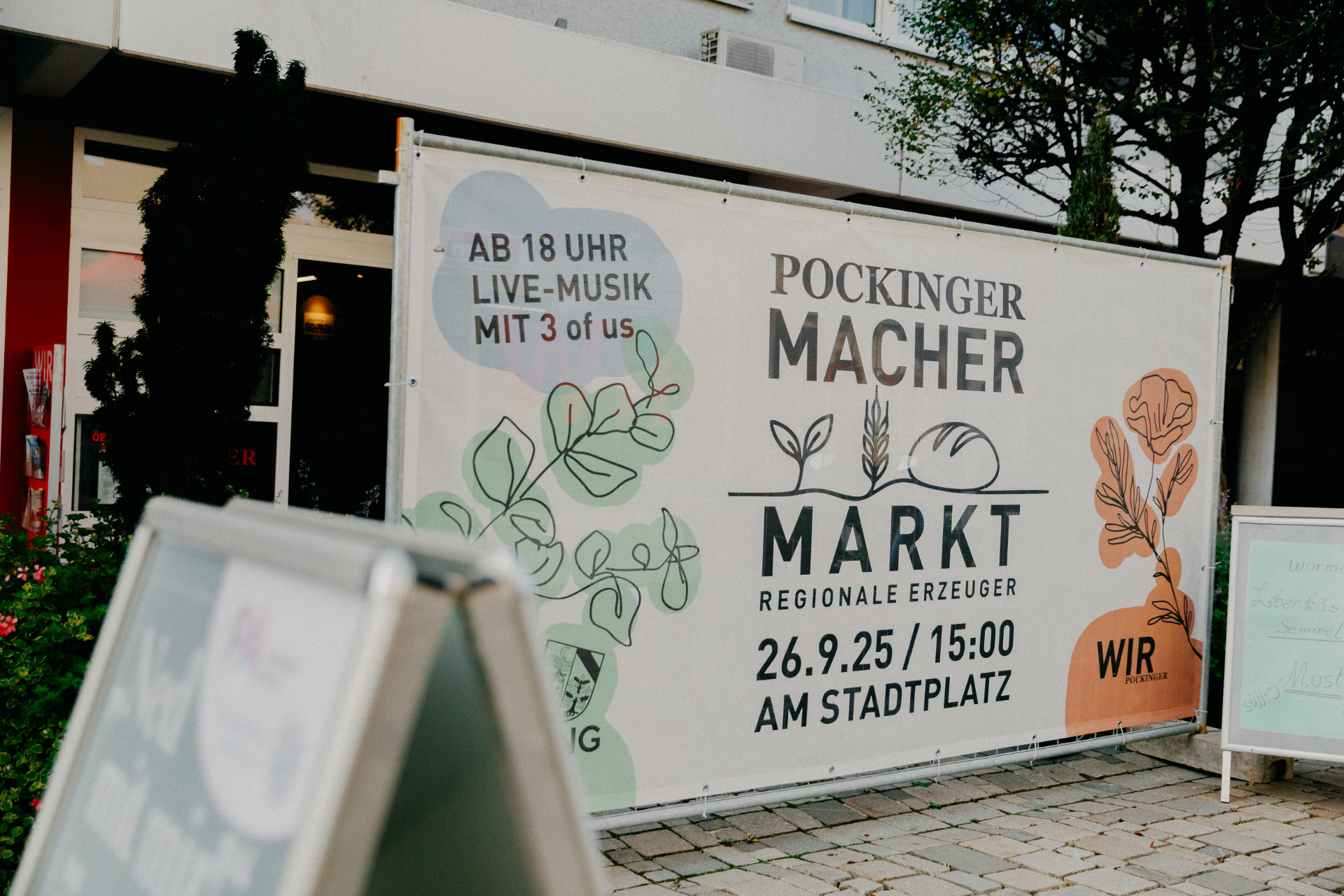 Pockiner Macher.Markt Bauzaunbanner